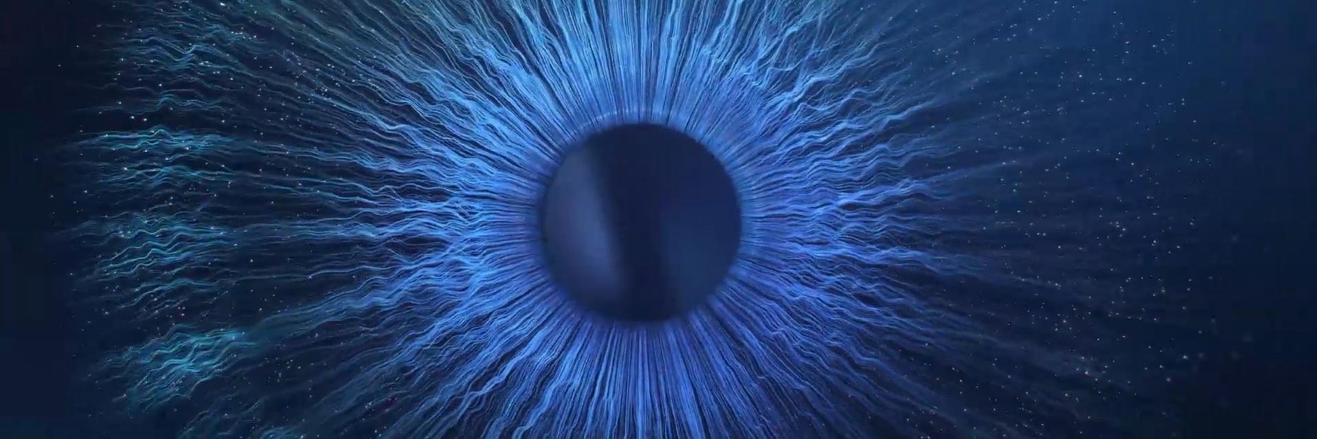 Meje domišljije so nam v izziv – posnetek modrega očesnega zrkla v temi od blizu.